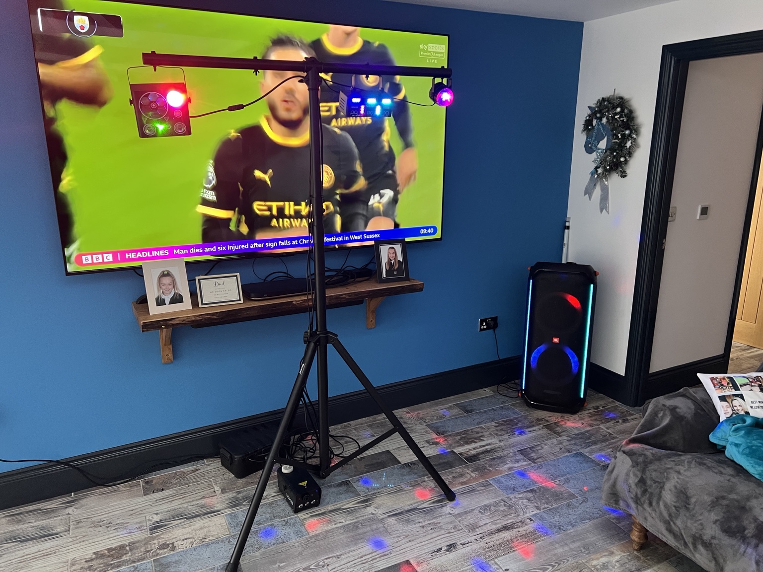 Indoor Party Package setup with a JBL speaker, colourful disco lights on a tripod stand and a smoke machine